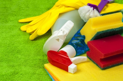 Technician moving carpet cleaning equipment with care